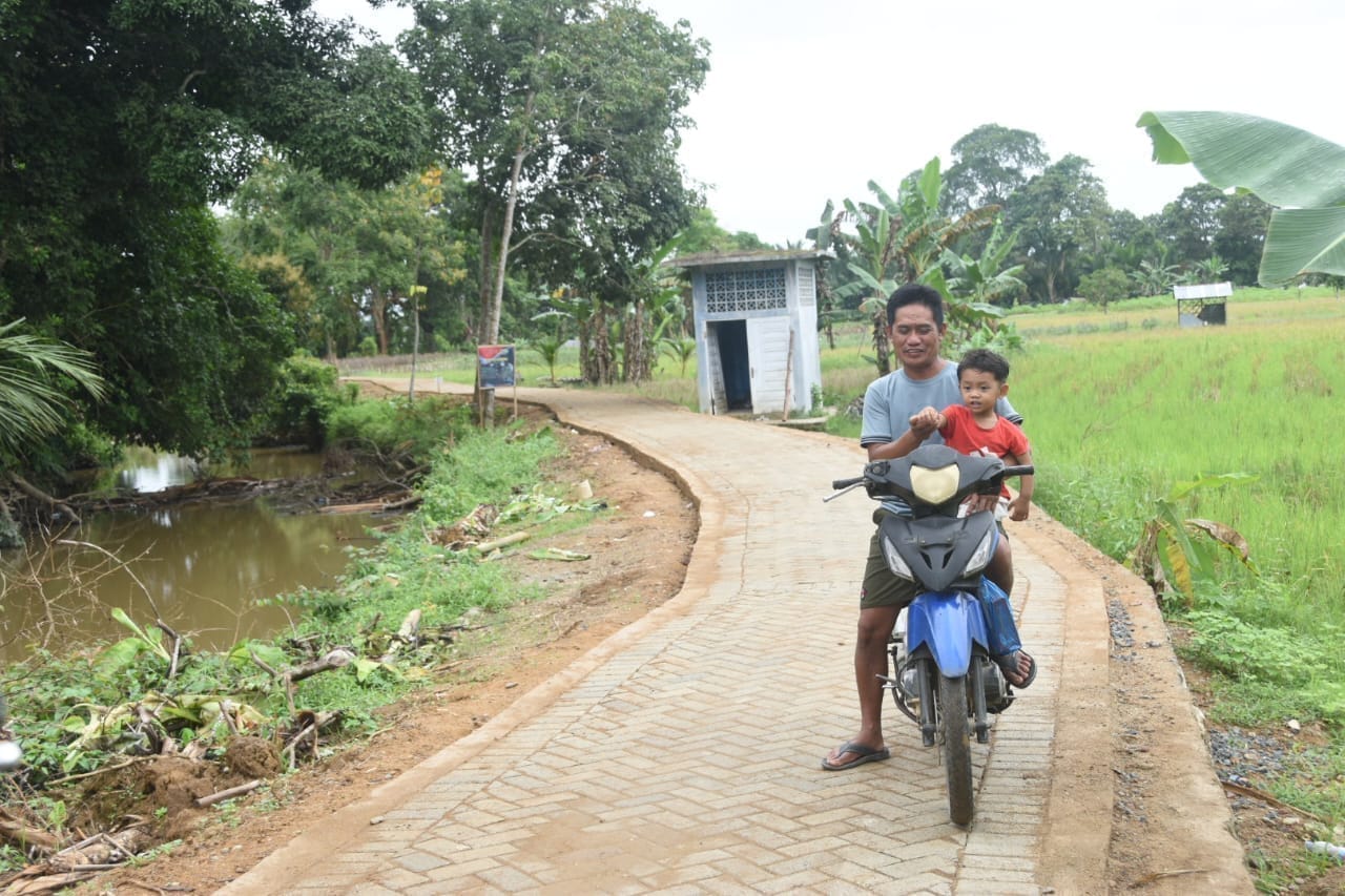 Jalan TMMD Buka Akses, Tingkatkan Kualitas Hidup Warga Pengambau