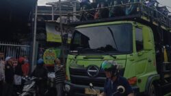 Bhabinkamtibmas Kelurahan Sukamulya Turun Tangan Atasi Kemacetan di Jalan Padat Karya