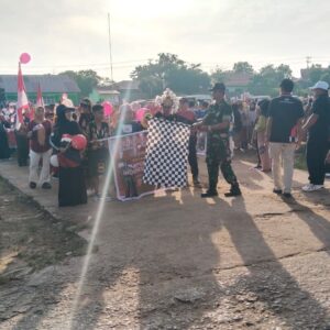 Tunjukkan Dukungan Terhadap Kegiatan Di Masyarakat, Anggota Koramil Hadiri Acara Pawai Pembangunan