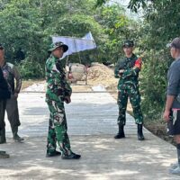 Dansatgas TMMD Wiltas Ke-127 Kodim 0912/Kubar Tinjau Langsung Progres Semenisasi Jalan di Linggang Amer