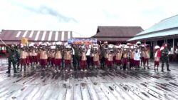 Koops TNI Habema Gelar Bhakti Pertiwi Hardiknas 2026 di SDN 1 Pomako