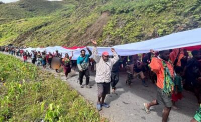 Peringatan Hari Lahir Pancasila, 800 Warga Puncak Jaya Kirab Bendera 50 Meter Peringatan Hari Lahir Pancasila, 800 Warga Puncak Jaya Kirab Bendera 50 Meter
