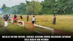 Melalui Gotong Royong, Babinsa Bersama Warga Wujudkan Lapangan Bola Bersih dan Nyaman
