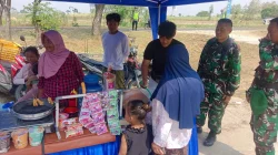 Seteguk Kesegaran Es Dawet Yogik: Cerita Manis Kemanunggalan TNI dan Warga di TMMD 129 Bojonegoro
